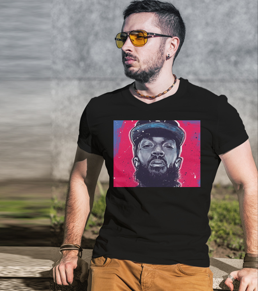 Nipsey Hussle Bold Street Style Portrait With Cap And Vibrant Red Blue T-Shirt