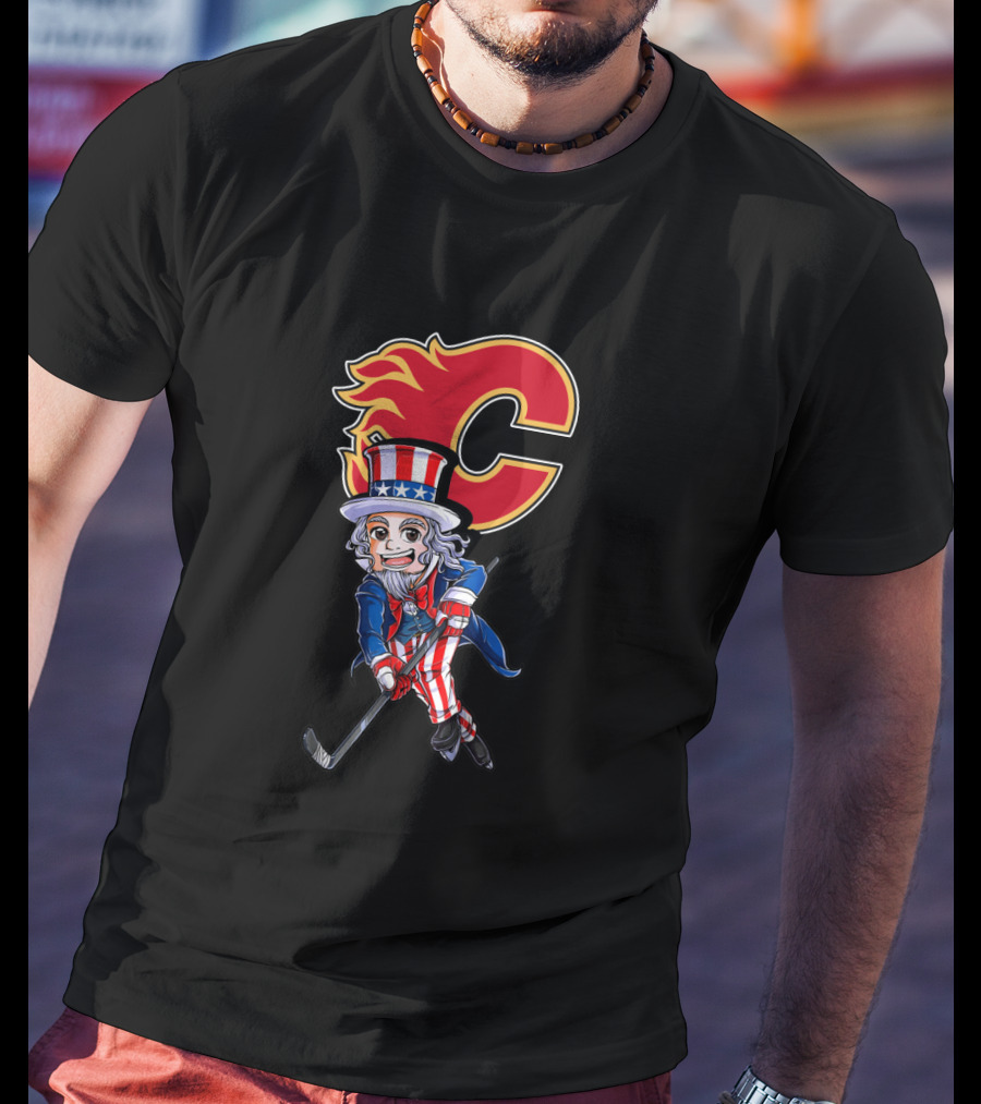 Uncle Sam Playing Hockey With Calgary Flames Emblem For 4Th Of July Celebration T-Shirt