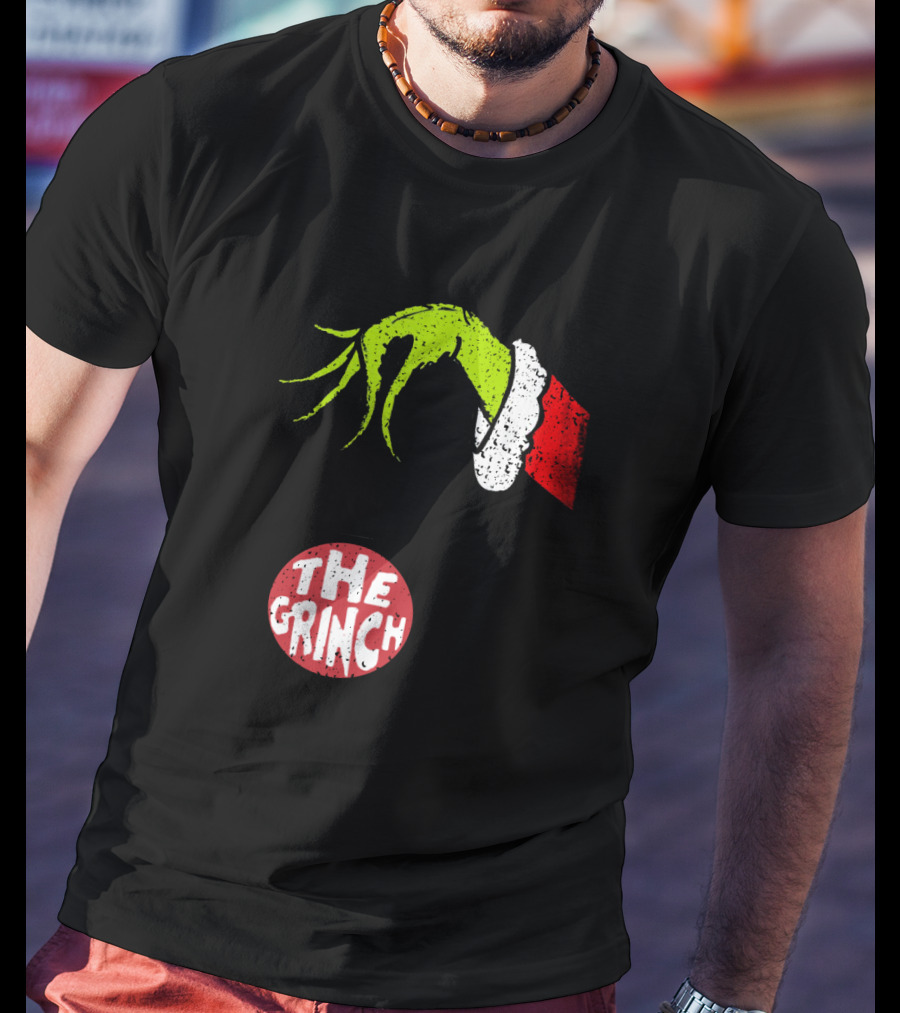 The Grinch Hand Holding Red Ornament With The Grinch Text T-Shirt