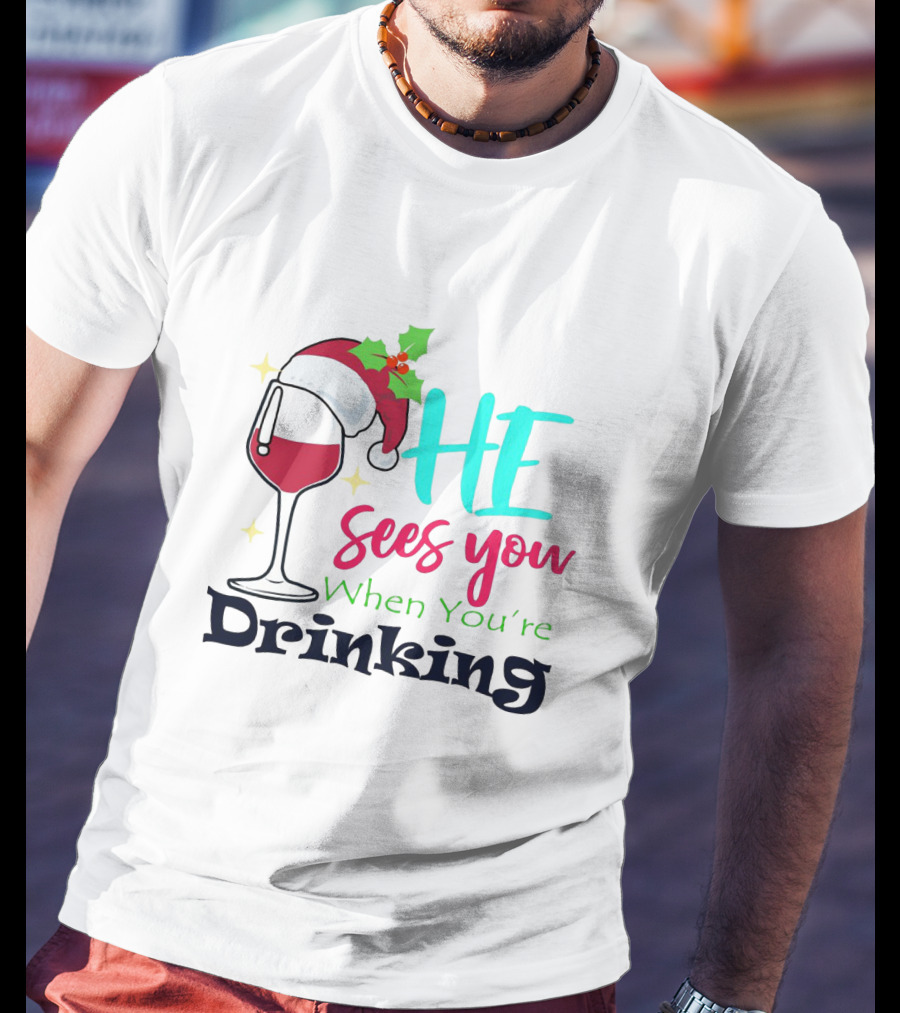 Santa Hat On Wine Glass With 'He Sees You When You're Drinking' Christmas Festive T-Shirt
