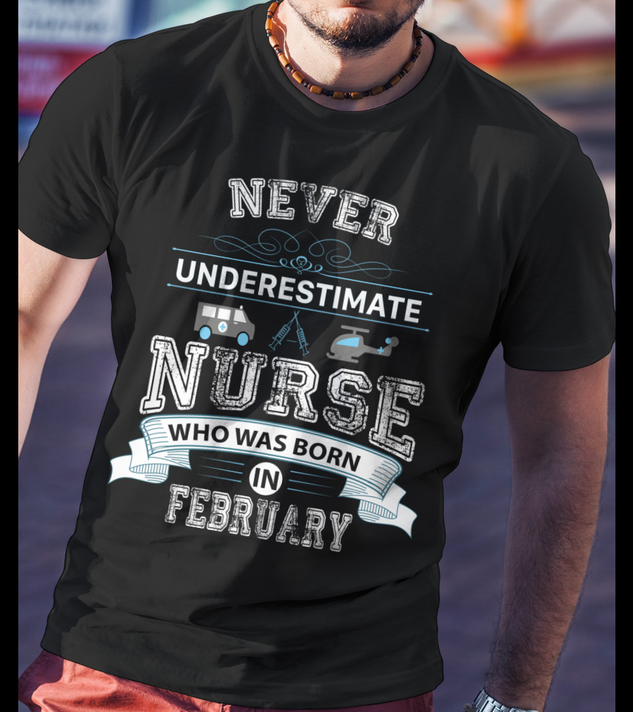 Never Underestimate A Nurse Who Was Born IN February With Medical Symbols And Transport Icons T-Shirt