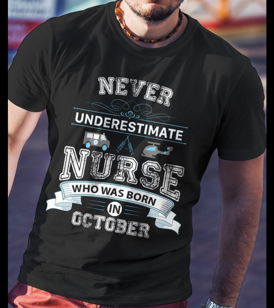 Never Underestimate A Nurse Who Was Born In October Helicopter Ambulance T-Shirt