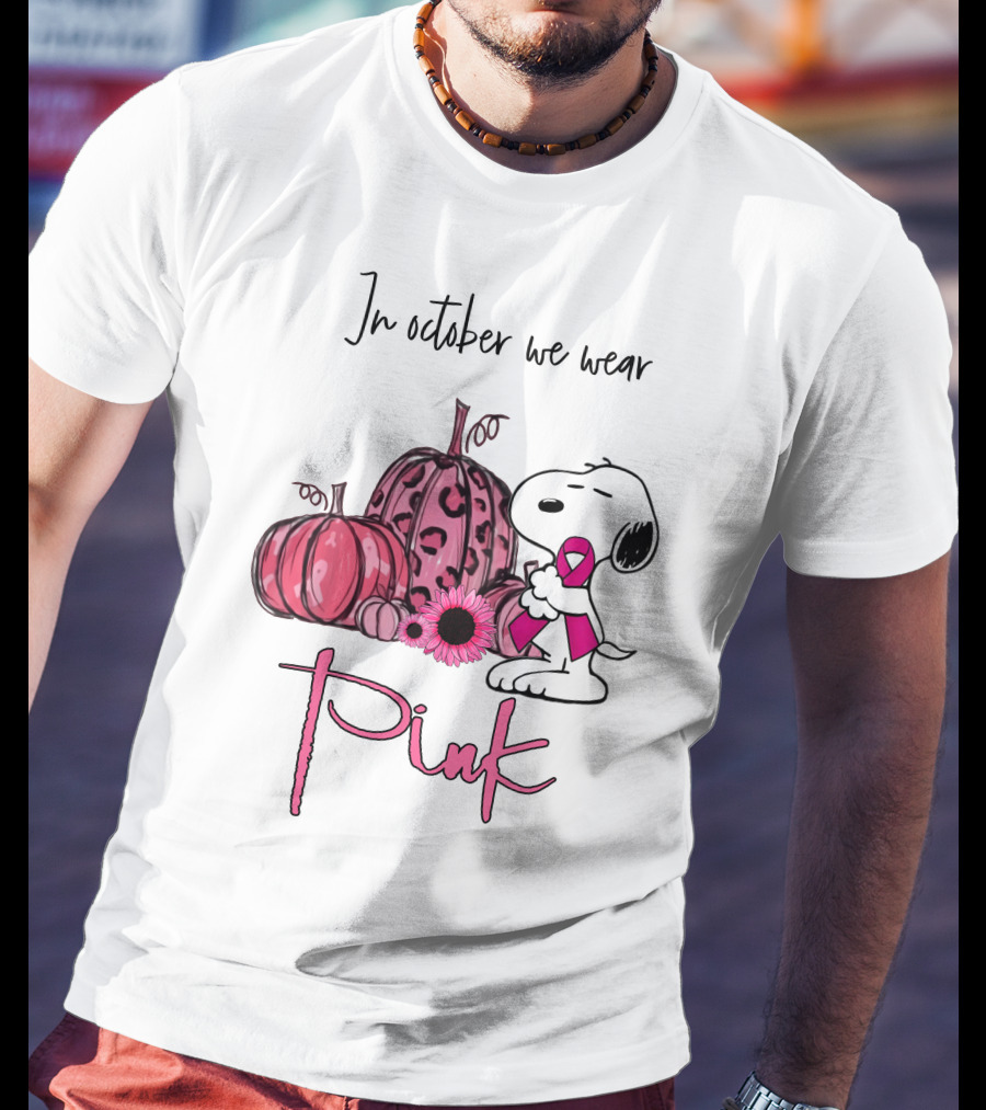 In October We Wear Pink With Peanuts Character Holding Ribbon And Pumpkins T-Shirt