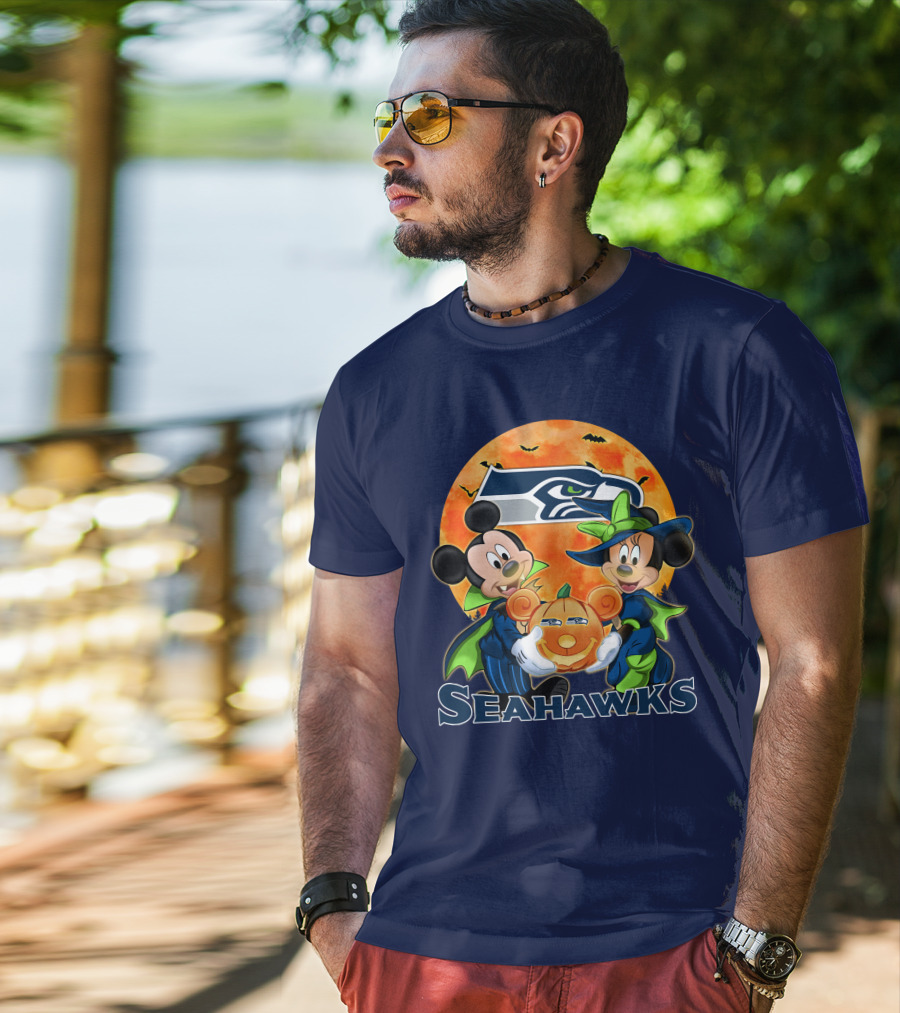 Seattle Seahawks Mickey Mouse And Minnie Mouse Halloween Pumpkin T-Shirt