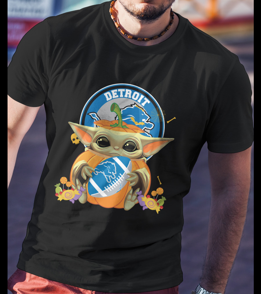 Halloween Pumpkin Baby Yoda Holding Detroit Lions Football With Logo And Candy T-Shirt