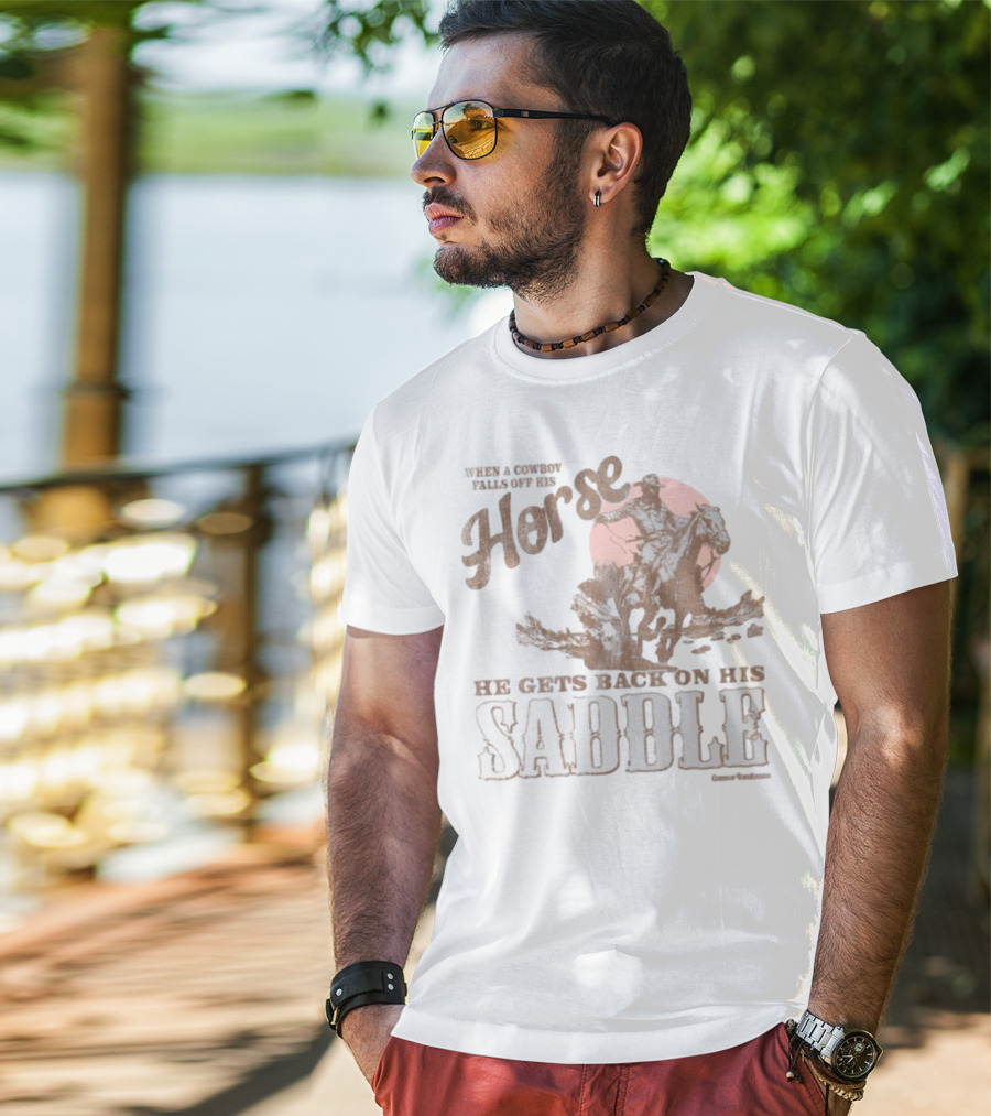 When A Cowboy Falls Off His Horse He Gets Back On His Saddle T-Shirt