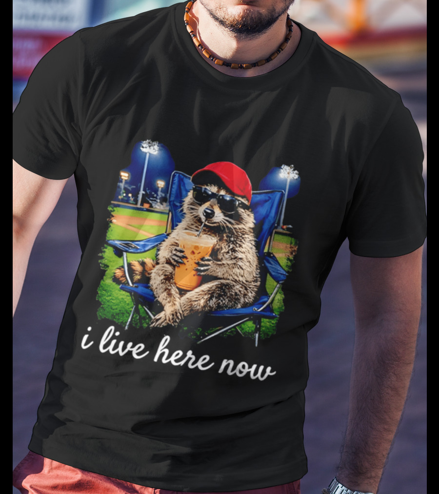 Raccoon I Live Here Now With Sunglasses And Drink At Baseball Field T-Shirt