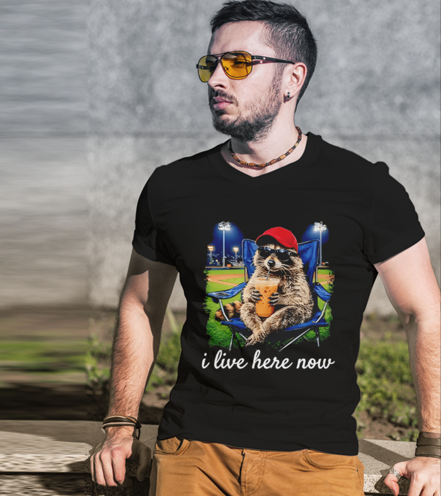 Raccoon I Live Here Now With Sunglasses And Drink At Baseball Field T-Shirt