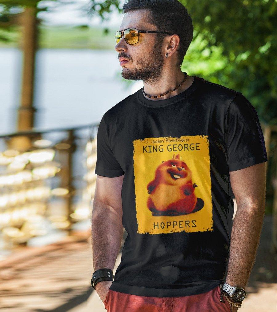 Bobby Moynihan Is King George Hoppers Smiling Cartoon Character With Crown On Orange T-Shirt