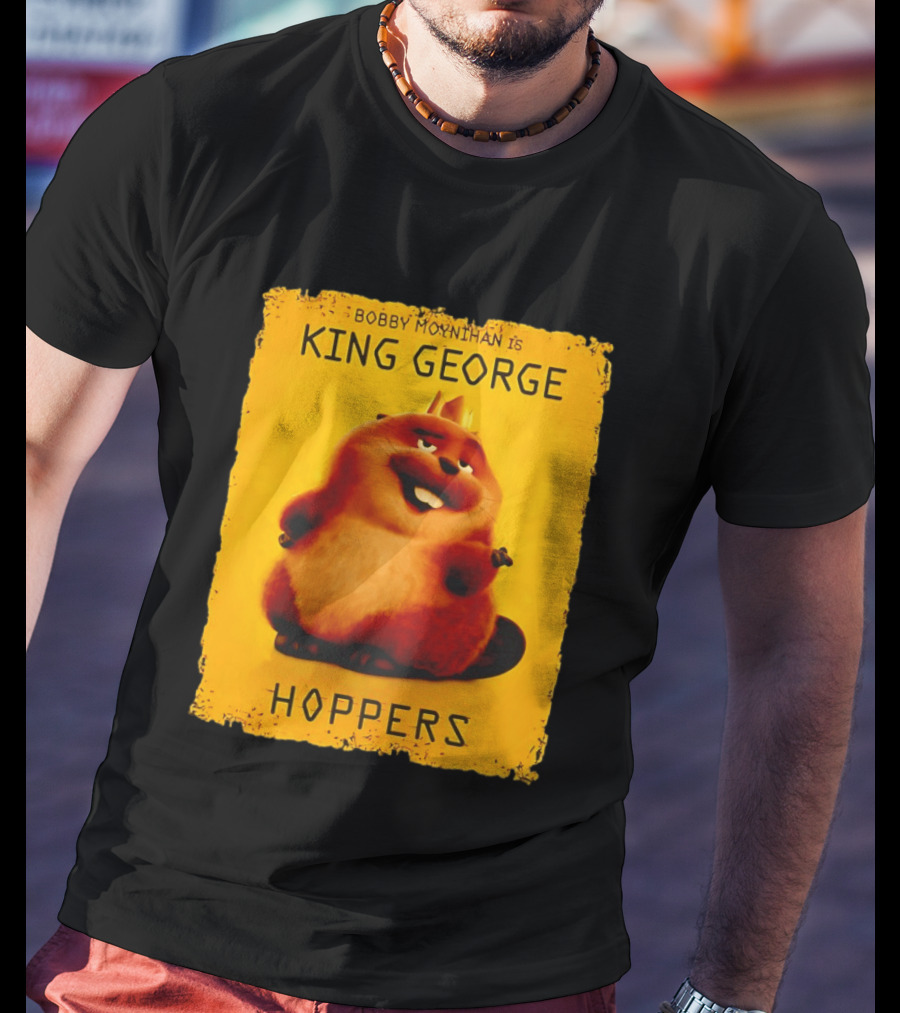 Bobby Moynihan Is King George Hoppers Smiling Cartoon Character With Crown On Orange T-Shirt