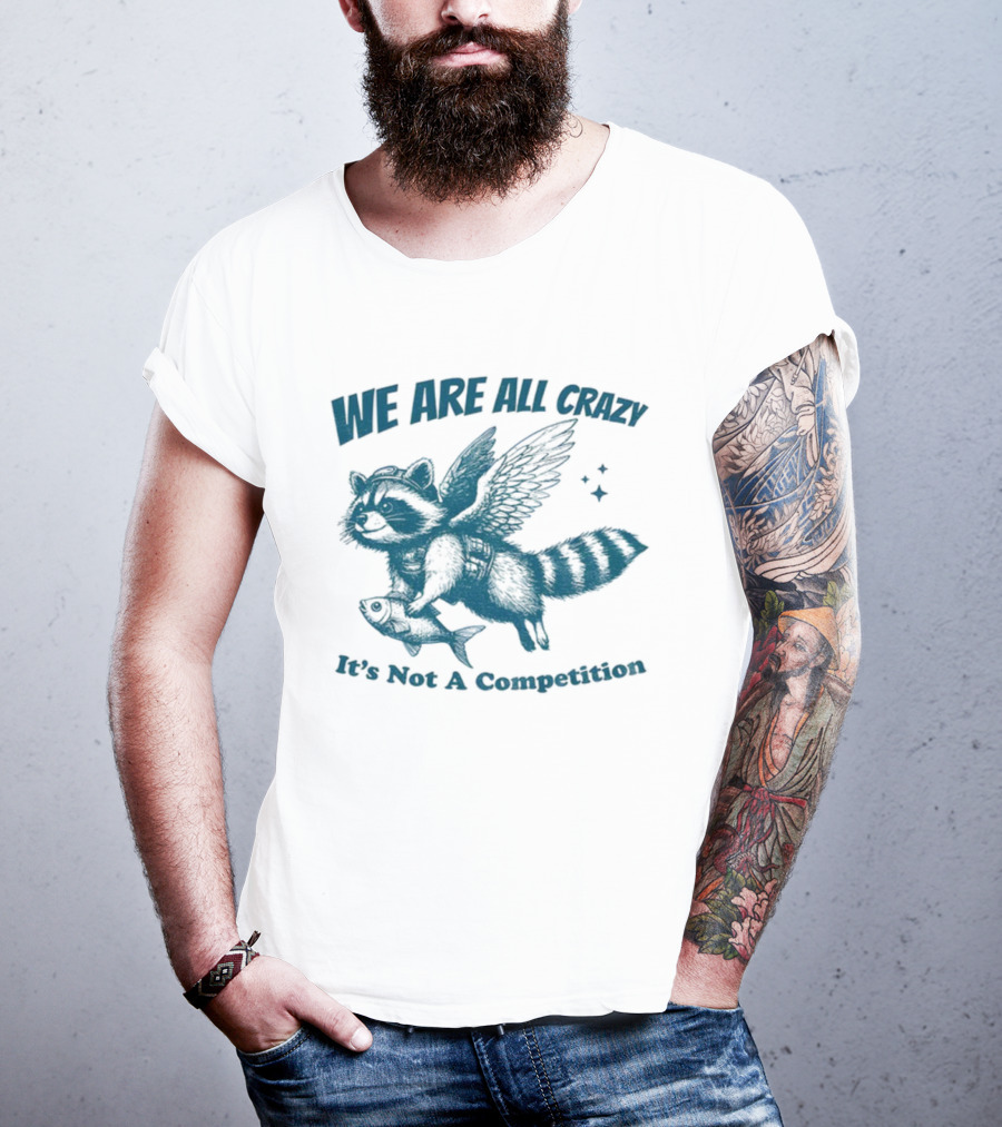 Raccoon With Wings Holding Fish We Are All Crazy It's Not A Competition T-Shirt