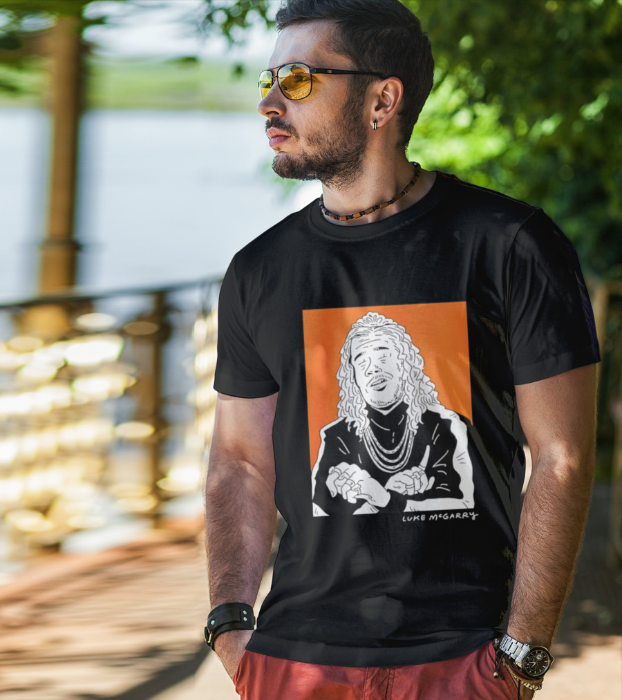 Luke McGarry Cartoon Character With Long Hair And Chains On Orange T-Shirt