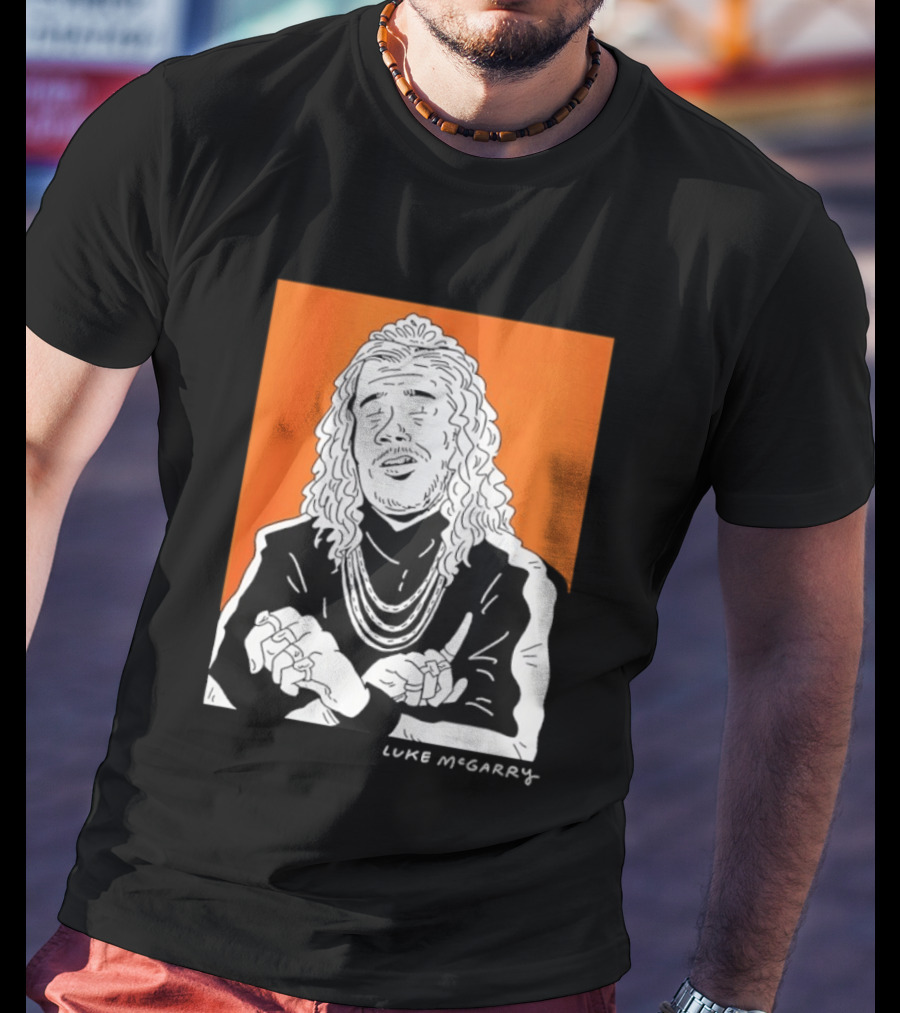Luke McGarry Cartoon Character With Long Hair And Chains On Orange T-Shirt