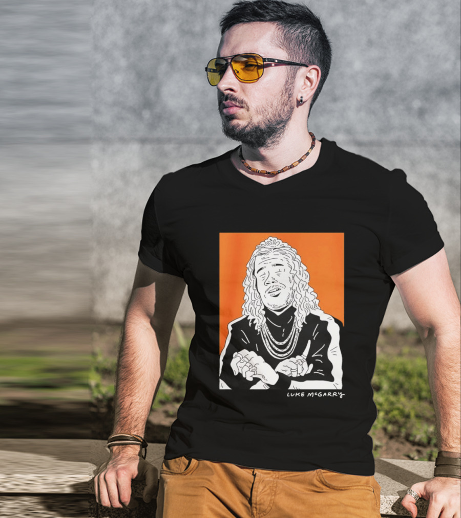 Luke McGarry Cartoon Character With Long Hair And Chains On Orange T-Shirt