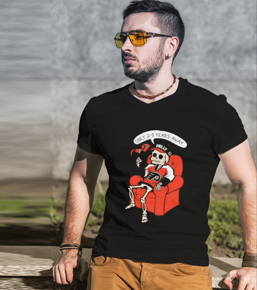 Flyers Skeleton Fan Waiting In Armchair With Cap And Jersey 2 3 Years Away T-Shirt