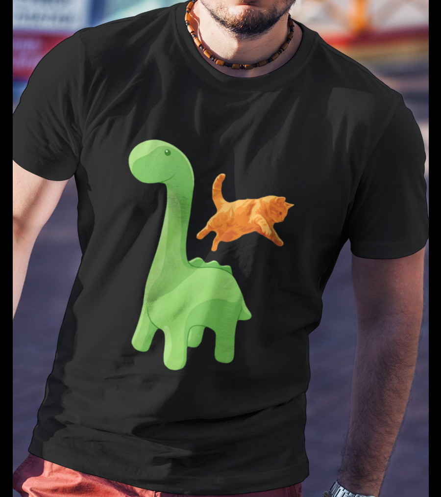 Cat Jumping Over Green Dinosaur Cartoon Image T-Shirt