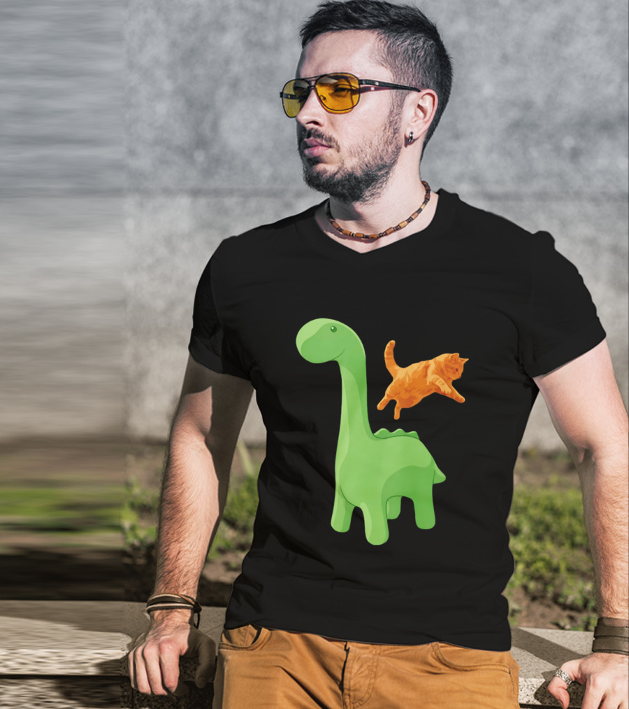 Cat Jumping Over Green Dinosaur Cartoon Image T-Shirt