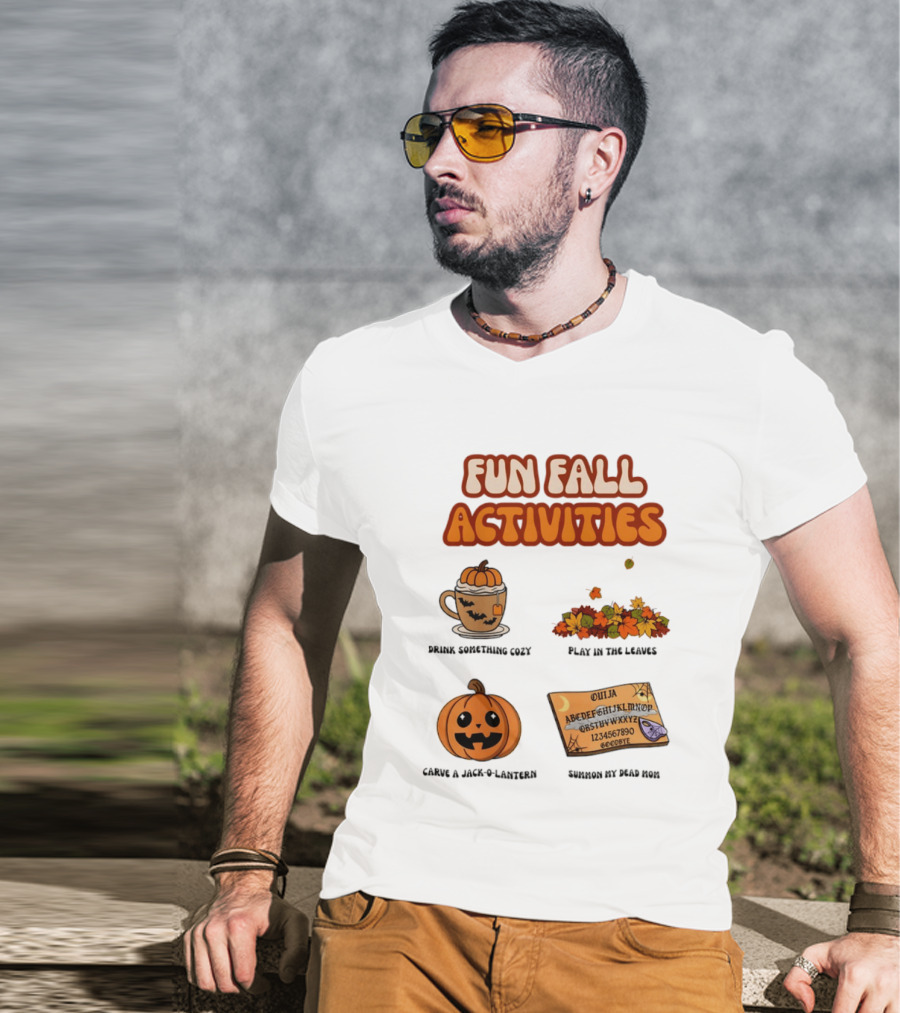 Fun Fall Activities Halloween Drink Something Cozy Ouija Board Carve A Jack O Lantern Play In The Leaves T-Shirt