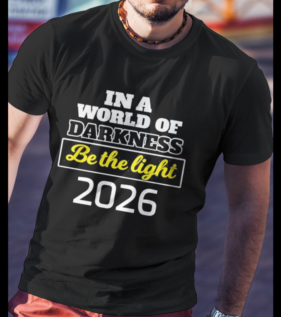 In A World Of Darkness 2026 Be The Light T-Shirt