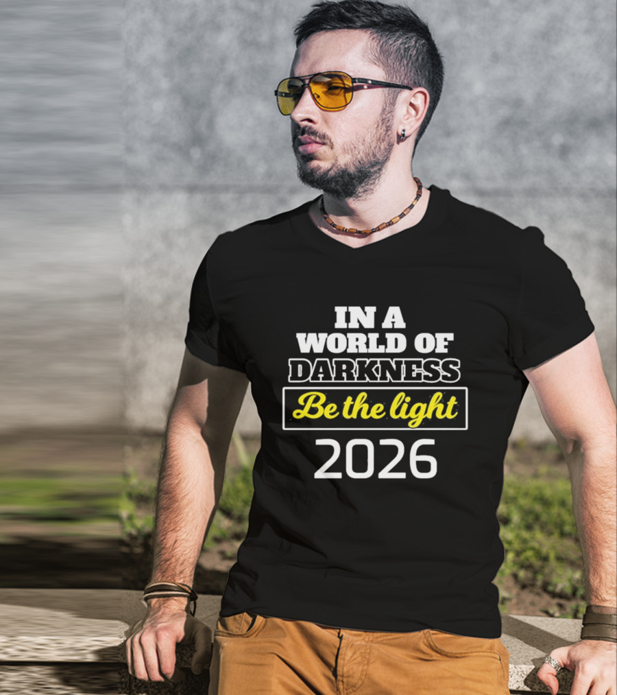 In A World Of Darkness 2026 Be The Light T-Shirt