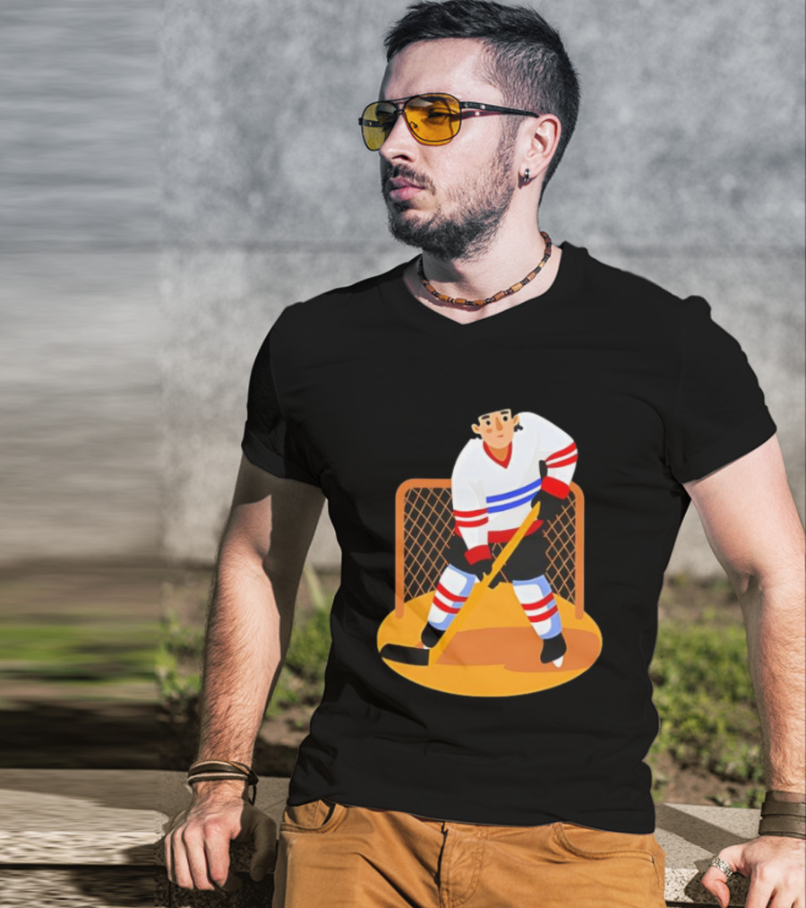 Ice Hockey Goalie In Action With Stick And Net Background T-Shirt