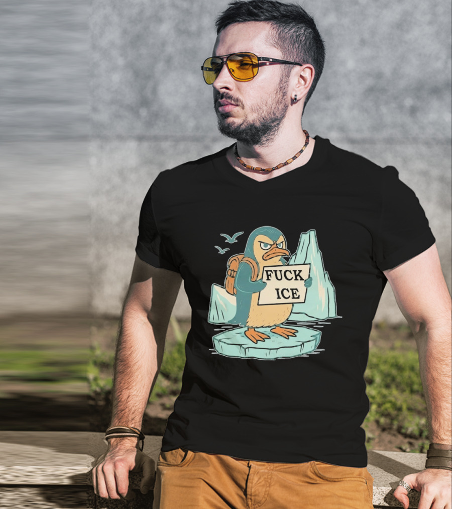 Angry Penguin Holding Sign On Iceberg With Birds In Background T-Shirt