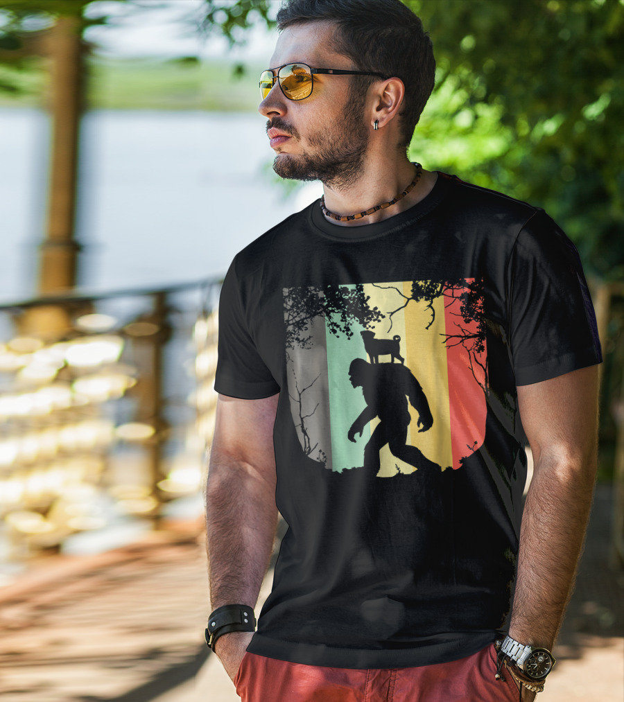 Pug Riding Bigfoot Vintage Retro Sunset Stripes T-Shirt
