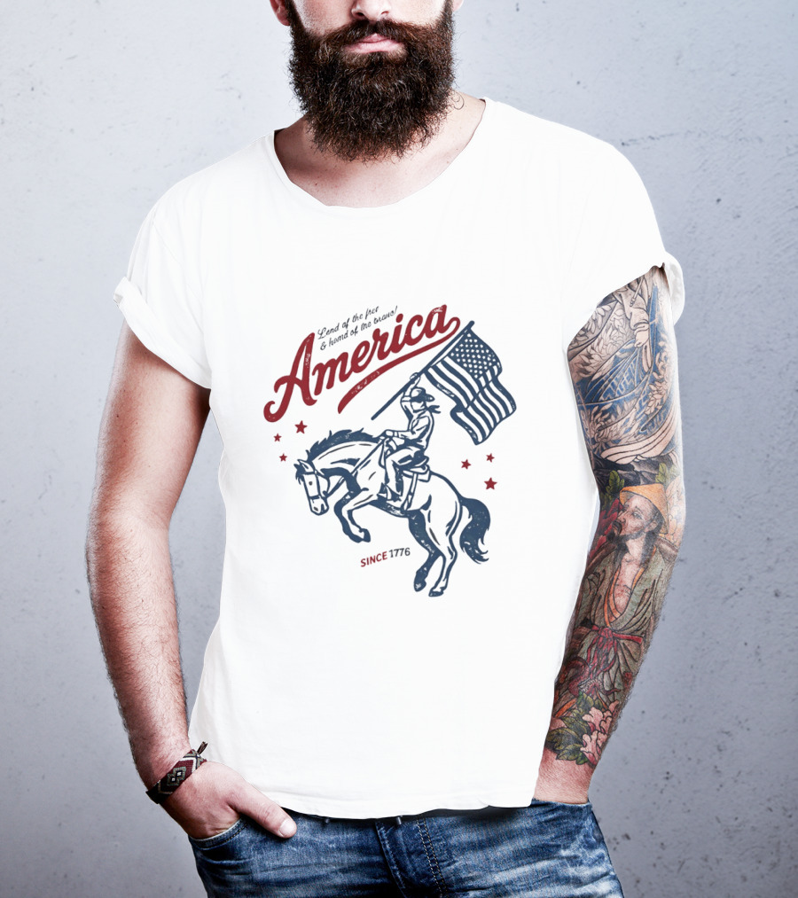 America Land Of The Free Home Of The Brave Since 1776 Cowboy Holding Flag Patriotic T-Shirt