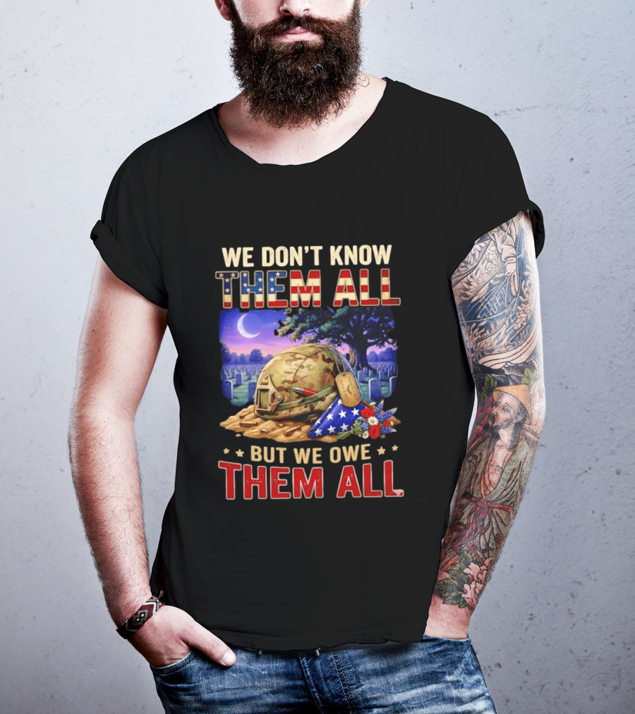 We Don't Know Them All But We Owe Them All Military Memorial Helmet And Flag Gravesite Scene T-Shirt