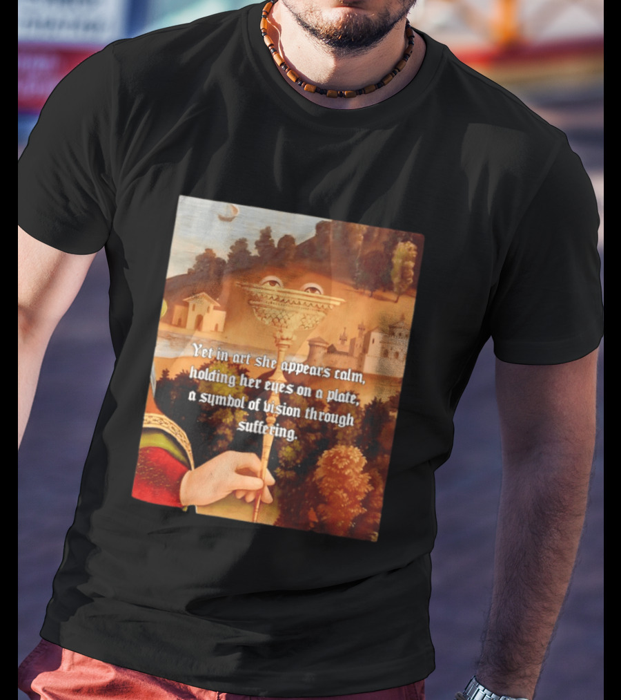 Yet In Art She Appears Calm Holding Her Eyes On A Plate A Symbol Of Vision Through Suffering T-Shirt