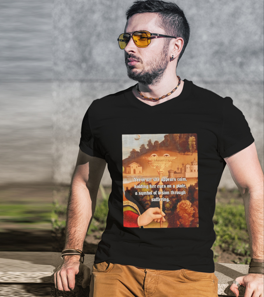 Yet In Art She Appears Calm Holding Her Eyes On A Plate A Symbol Of Vision Through Suffering T-Shirt