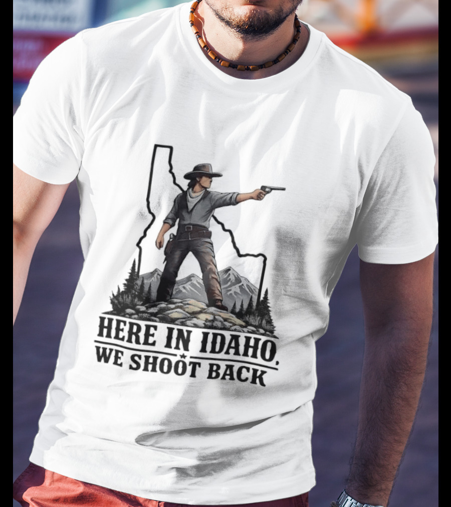 Here In Idaho We Shoot Back Cowboy With Pistol In State Mountains Scene T-Shirt