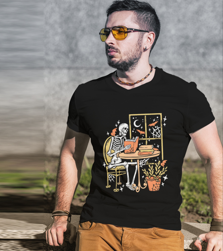 Cartoon Skeleton Reading Under Crescent Moon With Bats Orange Book Table Window T-Shirt