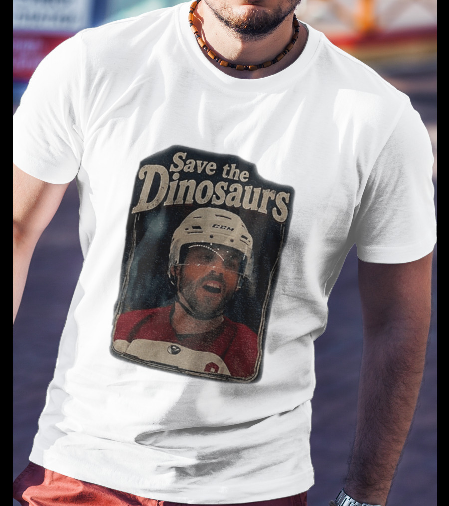Connor Storrie Wearing Scott Hunter Save The Dinosaurs CCM Hockey T-Shirt