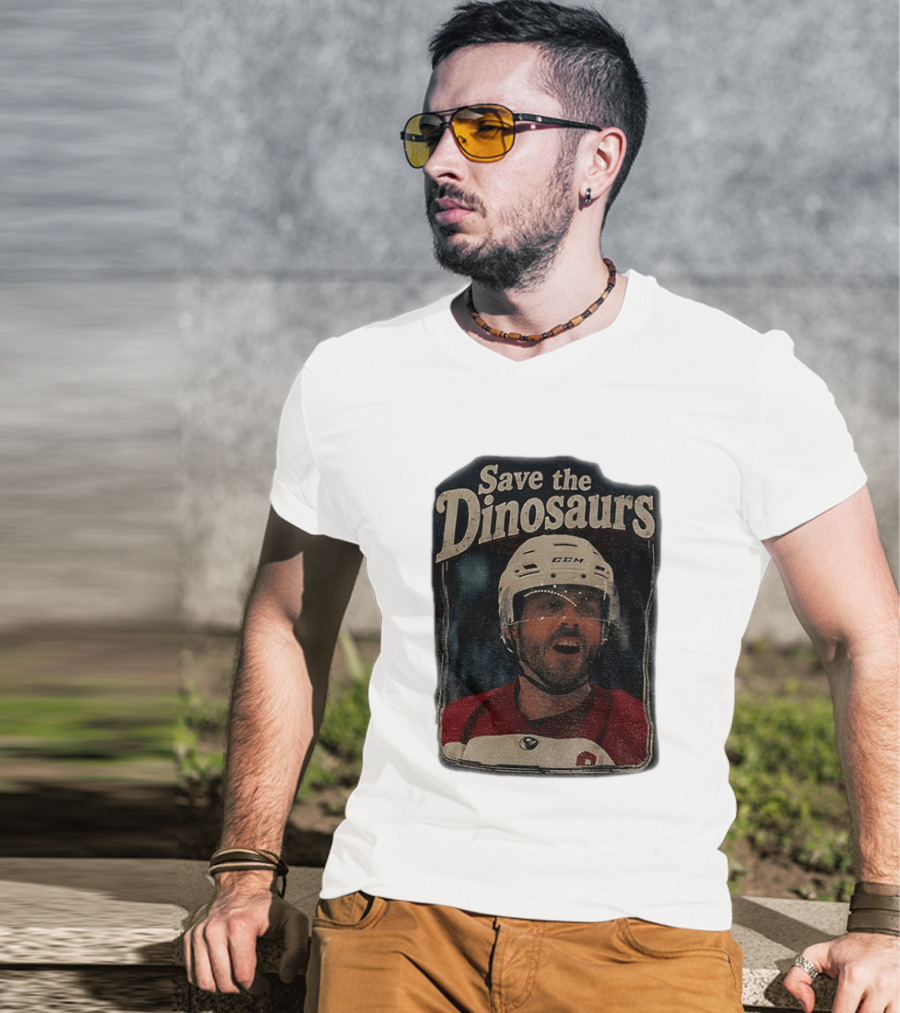 Connor Storrie Wearing Scott Hunter Save The Dinosaurs CCM Hockey T-Shirt