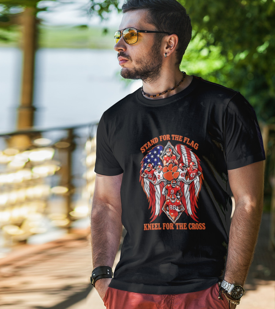 Clemson Tigers Stand For The Flag Kneel For The Cross 2026 American Flag Football Paw T-Shirt