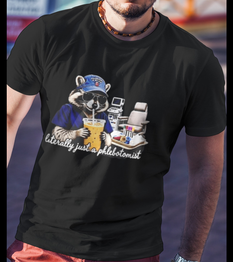 Raccoon Phlebotomist In Scrubs Sipping Drink With Blood Collection Tubes T-Shirt