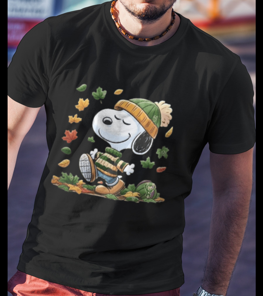 Milwaukee Bucks Snoopy In Beanie Walking Through Autumn Leaves Cartoon T-Shirt