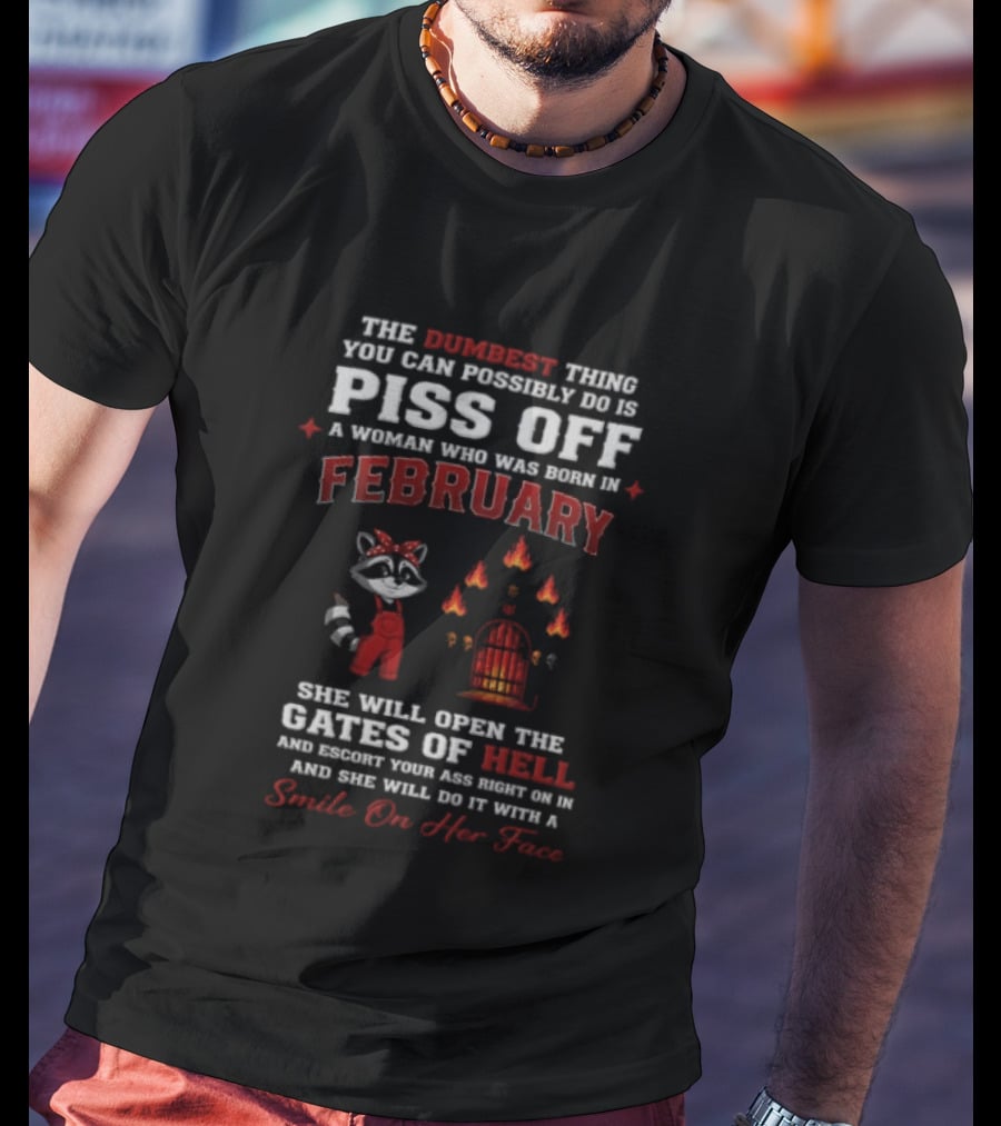 The Dumbest Thing You Can Possibly Do Is Piss Off A Woman Born In February Raccoon Gates Of Hell With A Smile On Her Face T-Shirt