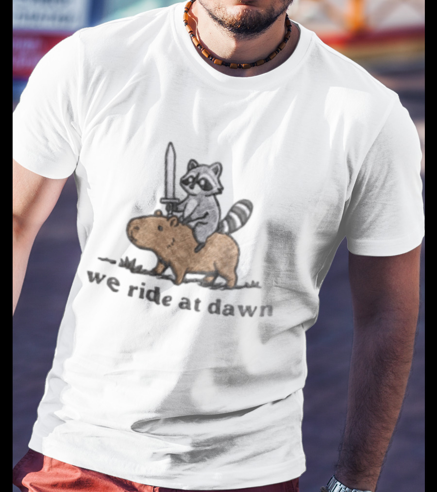 Raccoon Riding Capybara Sword We Ride At Dawn T-Shirt
