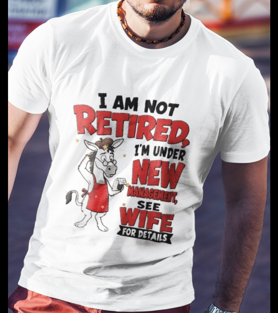 I Am Not Retired I'm Under New Management See Wife For Details Cartoon Donkey Red Apron T-Shirt