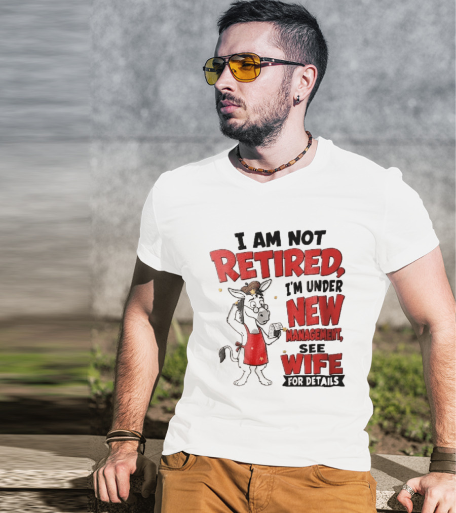 I Am Not Retired I'm Under New Management See Wife For Details Cartoon Donkey Red Apron T-Shirt
