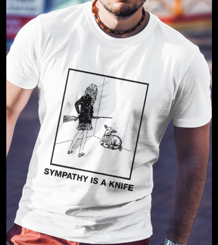 Sympathy Is A Knife Dark Silhouette Holding Object Next To Seated Figure T-Shirt