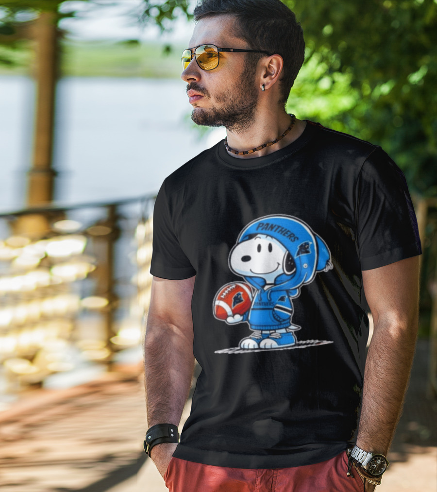 Snoopy Carolina Panthers Fan Holding Football Peanuts T-Shirt