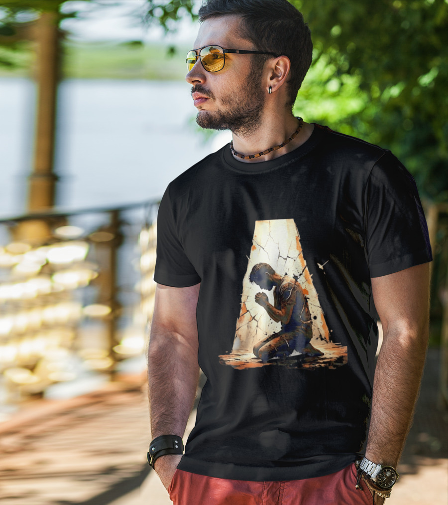 Man Kneeling In Prayer Spiritual Faith Devotion Cracked Wall And Light T-Shirt