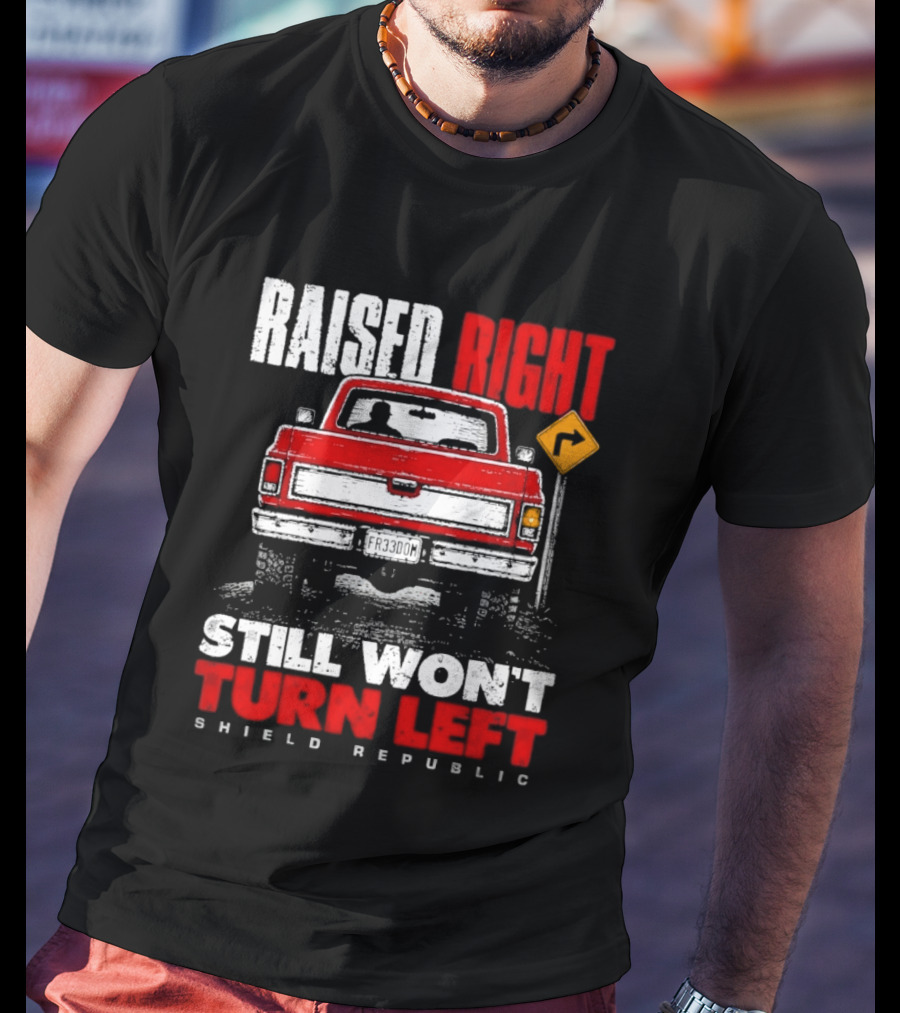 Raised Right Still Won't Turn Left Shield Republic Truck Back View With Right Turn Sign T-Shirt
