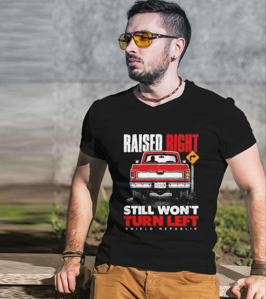 Raised Right Still Won't Turn Left Shield Republic Truck Back View With Right Turn Sign T-Shirt