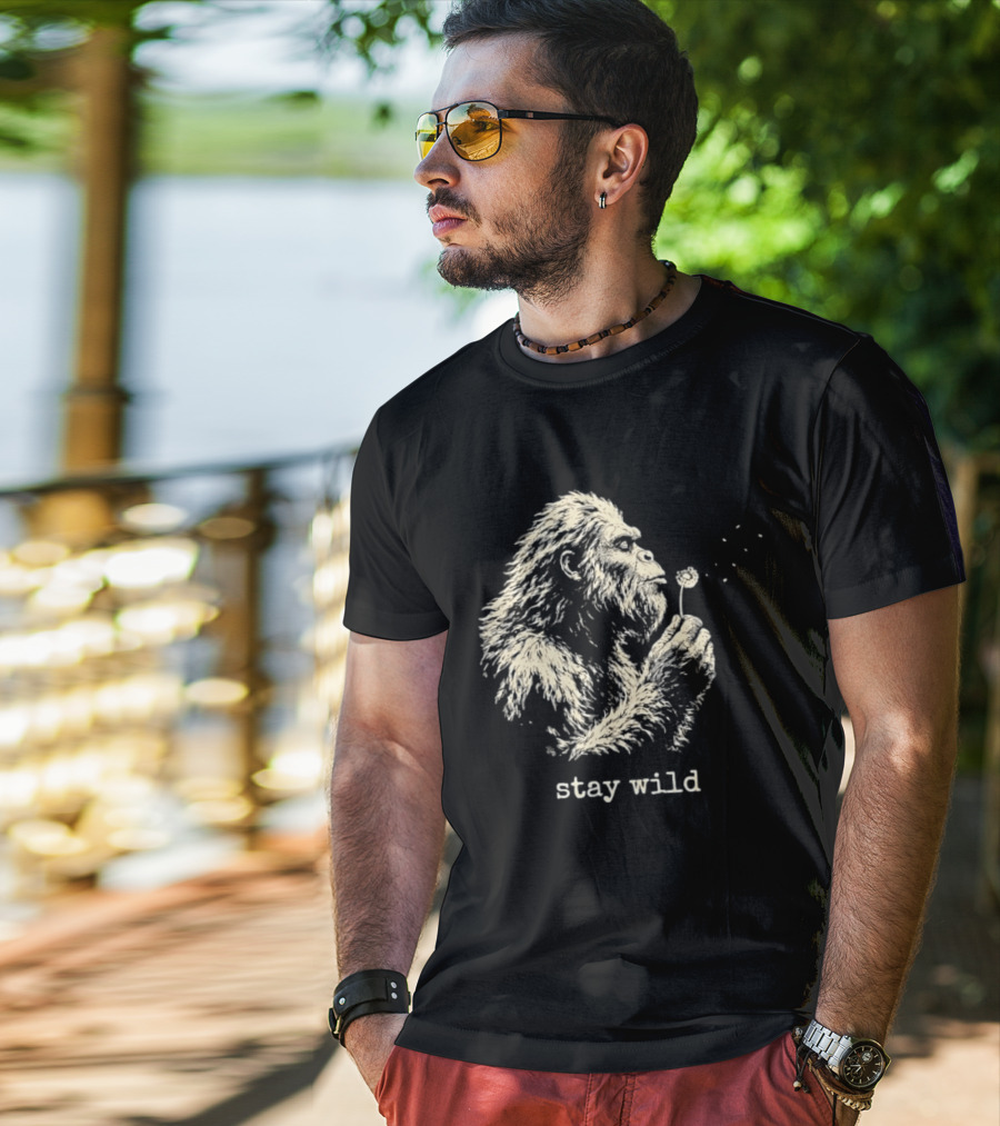Stay Wild Bigfoot Blowing Dandelion Seeds T-Shirt