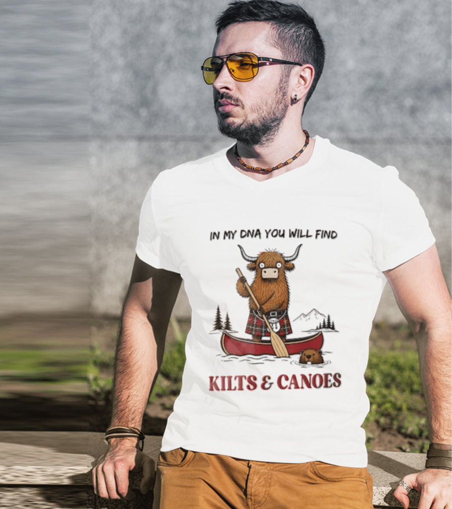 In My DNA You Will Find Kilts And Canoes Cartoon Highland Cow Paddling T-Shirt