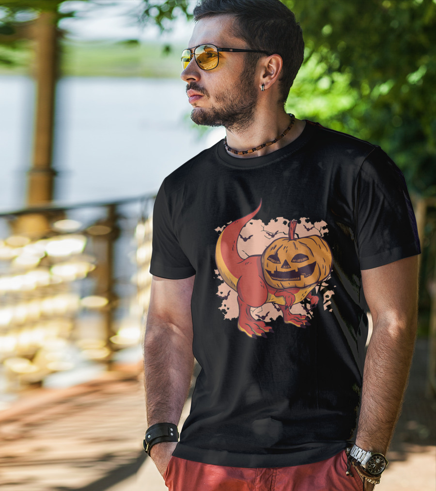 Pumpkin-Head Dinosaur With Jack-O'-Lantern Face And Creepy Background T-Shirt